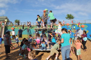 Children playing at hillside park