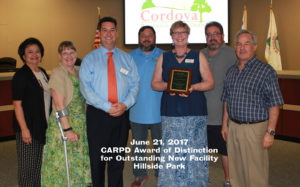 Board of Directors and staff accepting Outstanding New Facility award from CARPD