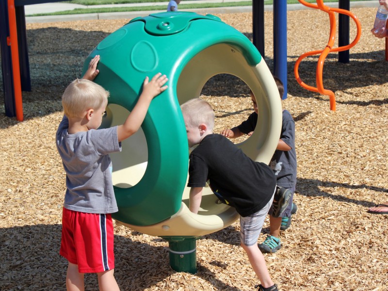 children playing at Sunridge Park playground